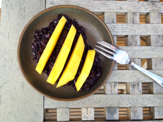 black coconut rice and mango porridge