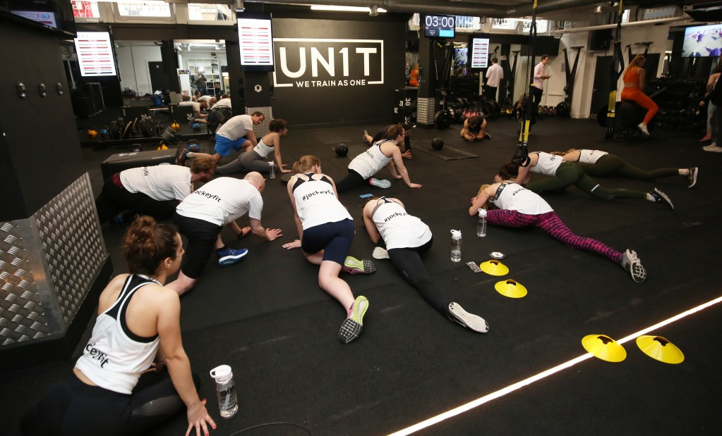 Stretching after a gruelling workout 