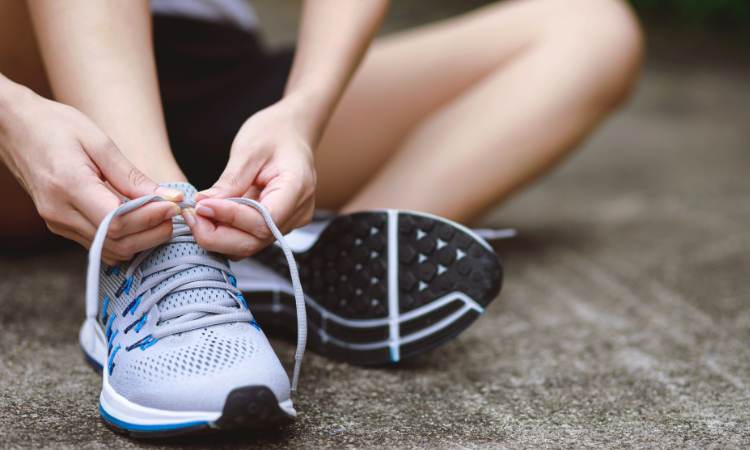 Running shoes being laced up