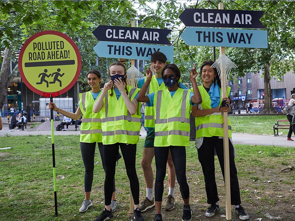 The Tenzing team direct runners to cleaner streets